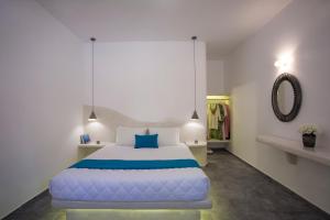 Letto o letti in una camera di TheArtemis Perissa
