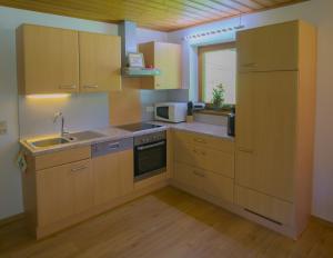 Kuchyň nebo kuchyňský kout v ubytování Apartment Bergblick + 37 fotografií
