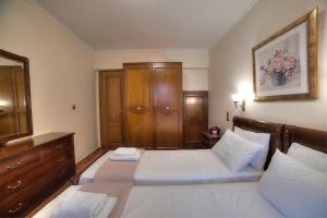 Posteľ alebo postele v izbe v ubytovaní Lagonisi Villa VIP