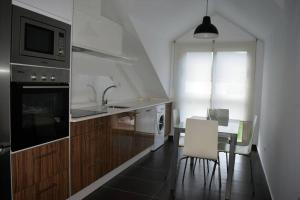 Köök või kööginurk majutusasutuses Apartamento Aldara a escasos metros de la playa