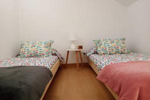 Cama ou camas em um quarto em Apartamento Aldara a escasos metros de la playa