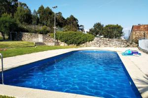 בריכת השחייה שנמצאת ב-Apartamento Aldara a escasos metros de la playa או באזור