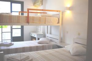 Postel nebo postele na pokoji v ubytování Polos Hotel Paros