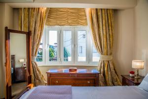 Posteľ alebo postele v izbe v ubytovaní Lagonisi Villa VIP