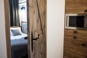 Posteľ alebo postele v izbe v ubytovaní Apart-Center Pod Orłem