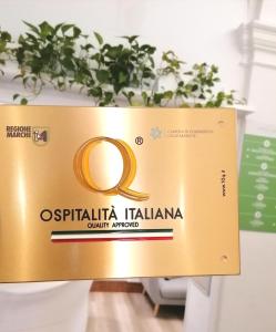 a box with the olympia italia logo on it at Hotel Lauri in Macerata