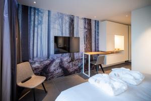 Postel nebo postele na pokoji v ubytování L'Ardenne Autrement Wellness include + 37 fotografií