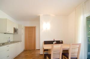 Kuchyň nebo kuchyňský kout v ubytování Garni Hotel Peterlinhof