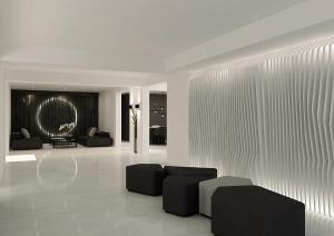 a living room with black furniture and a large window at Nimbus Mykonos in Agios Stefanos
