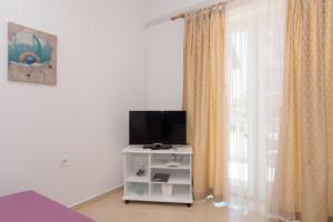 Телевизор и/или развлекательный центр в Apartments Lovrić