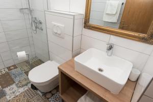 Ванная комната в Apartments Lovrić