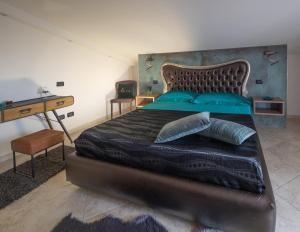 Un pat sau paturi într-o cameră la A casa di Sofy