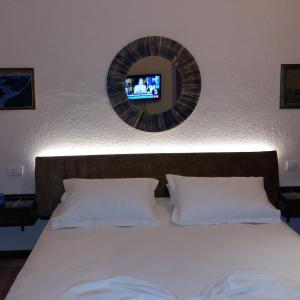 Letto o letti in una camera di Drini Hotel