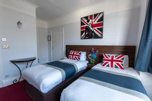 เตียงในห้องที่ New Steine Hotel - B&B
