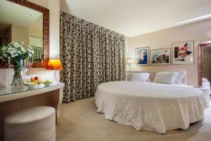 Letto o letti in una camera di Base Hotel