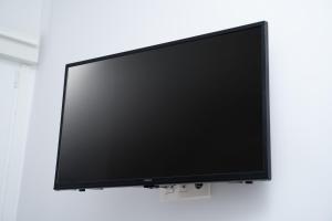 Telewizja i/lub zestaw kina domowego w obiekcie Bilbao High Apartment
