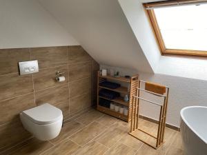 Koupelna v ubytování Traumhafte Dachgeschosswohnung