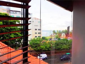- une vue depuis la fenêtre d'un parking dans l'établissement Malecon Cozy - Premium Plus 21, à Saint-Domingue