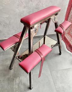 a stool and two chairs with red leather seats at LE DONJON Villa BDSM Port Nature VILLAGE Cap d'Agde naturiste in Cap d'Agde