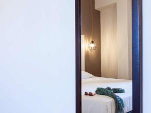 Postel nebo postele na pokoji v ubytování ibis styles Trani + 37 fotografií