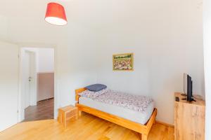 Кровать или кровати в номере Ferienwohnung Semler