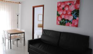 Posedenie v ubytovaní Apartamentos Regollera