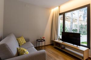 TV a/nebo společenská místnost v ubytování Sant Pere Homes