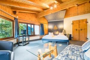 Katil atau katil-katil dalam bilik di Hotel Lindenhof by Crossworld AG