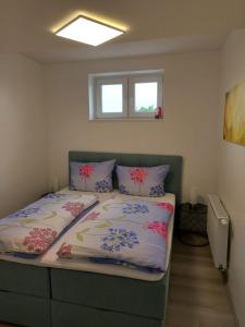 Una cama o camas en una habitación de Inselhof Usedom