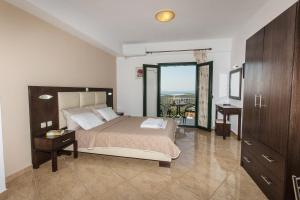 Posteľ alebo postele v izbe v ubytovaní Maria Resort Parga