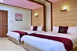 Krevet ili kreveti u jedinici u objektu Hotel Yong Cheng