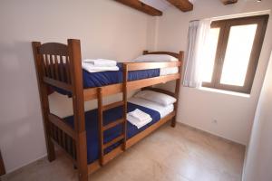 Postel nebo postele na pokoji v ubytování Apartamentos Casa Les Valeres