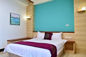 Krevet ili kreveti u jedinici u objektu Hotel Yong Cheng