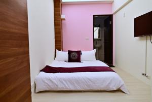 Krevet ili kreveti u jedinici u objektu Hotel Yong Cheng