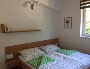 Vuode tai vuoteita majoituspaikassa Apartman U sjezdovky
