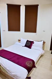 Krevet ili kreveti u jedinici u objektu Hotel Yong Cheng