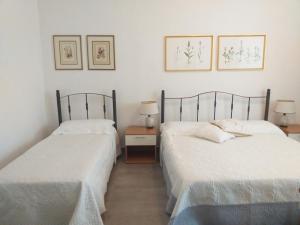 Postel nebo postele na pokoji v ubytování LOCANDA Roma sleep & food
