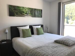 Postel nebo postele na pokoji v ubytování Penthouse Lebierre + 26 fotografií