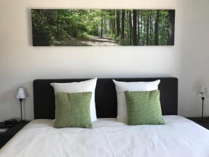 Postel nebo postele na pokoji v ubytování Penthouse Lebierre