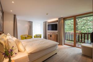 Letto o letti in una camera di Europe Hotel & Spa