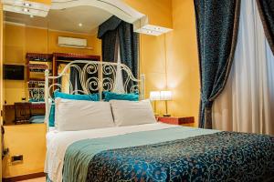Cama ou camas em um quarto em Hotel Canova