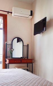 TV a/nebo společenská místnost v ubytování Fantasia Villas Deluxe "Selene"