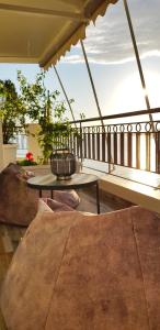 Balkón nebo terasa v ubytování Asi Rooftop Hotel