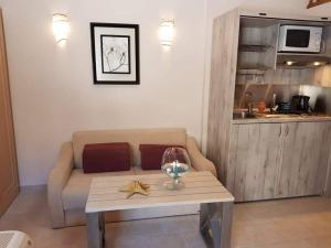 A kitchen or kitchenette at Arginonta Beach Apartments