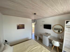 TV a/nebo společenská místnost v ubytování Leonidas Resort