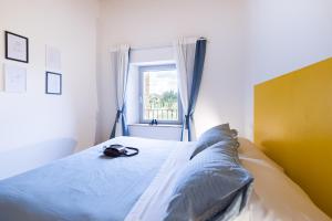 A bed or beds in a room at Tenuta La Santissima