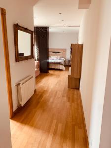 A bed or beds in a room at Estudios Blanmart Még 9 kép