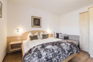 Letto o letti in una camera di Sonnleitn