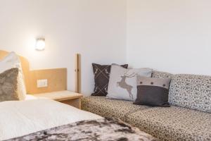 Letto o letti in una camera di Sonnleitn