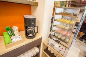 Kuchyň nebo kuchyňský kout v ubytování Fantasy Homestay